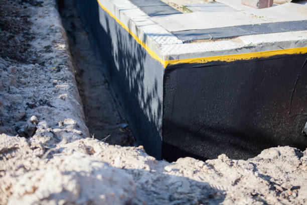 Professional Waterproofing technician working in Buffalo, NY